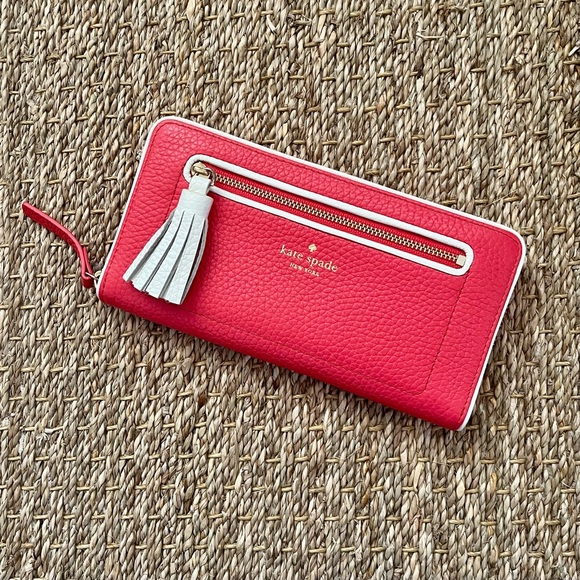 kate spade Handbags - Kate Spade Poppy Pink and White Tasselled Leather Clutch